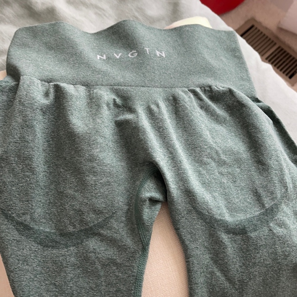 Nvgtn size small contour leggings. Light green coloring.